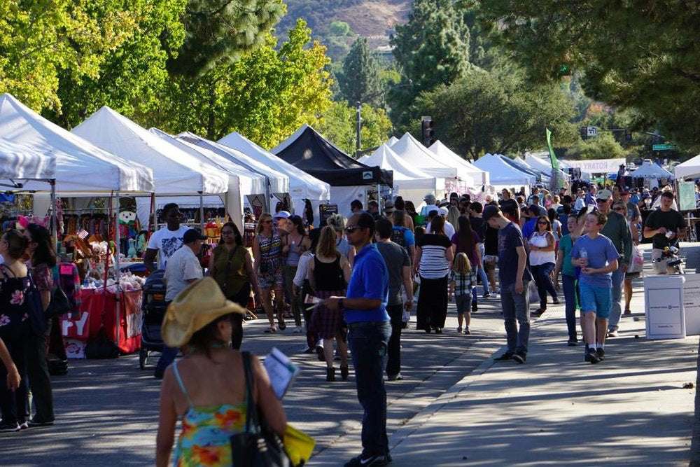 Vendor tents and visitors at the Thousand Oaks Rotary Street Fair